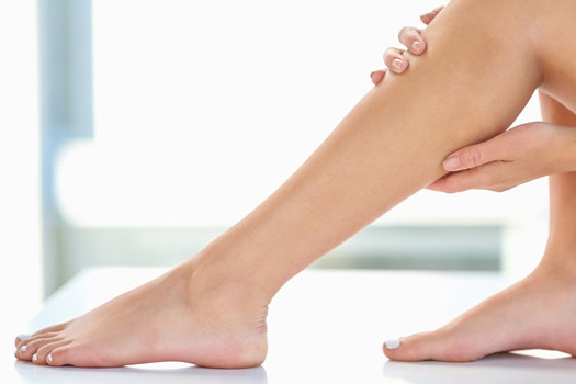 Smooth, healthy legs representing results of vein care treatment